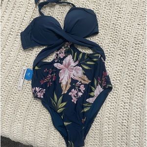 1 piece Cupshe bathing suit. Size medium. Blue with floral print.